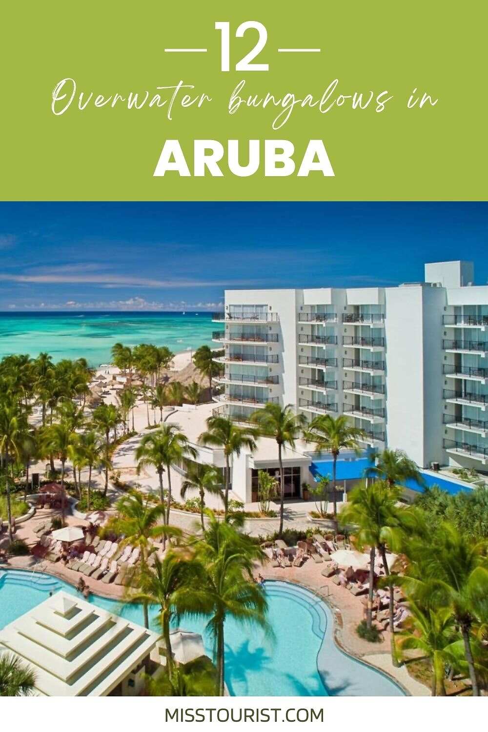 view of a hotel with ocean in the background