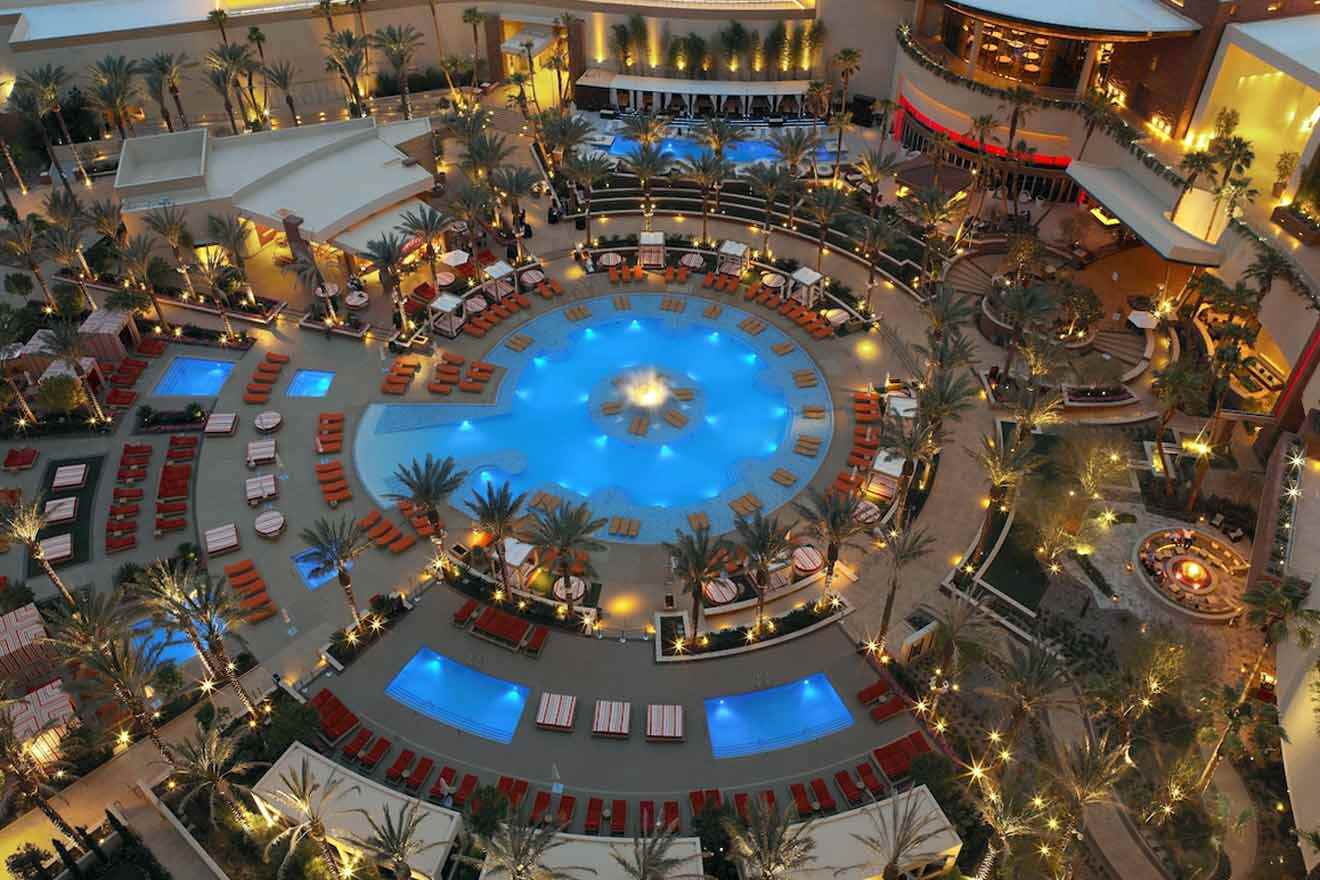 An aerial view of a hotel pool at night.