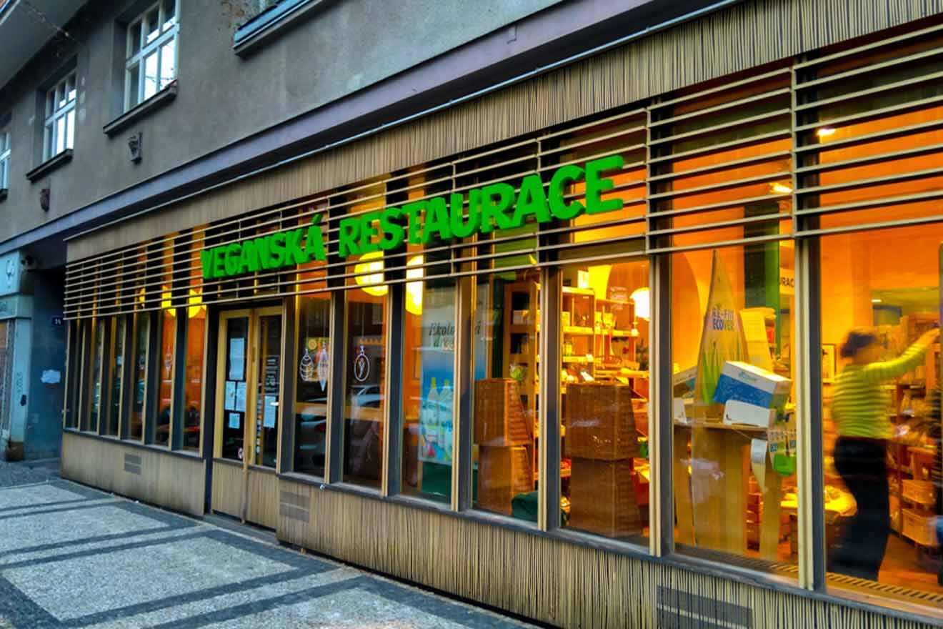 The front of a vegan restaurant with a green sign.