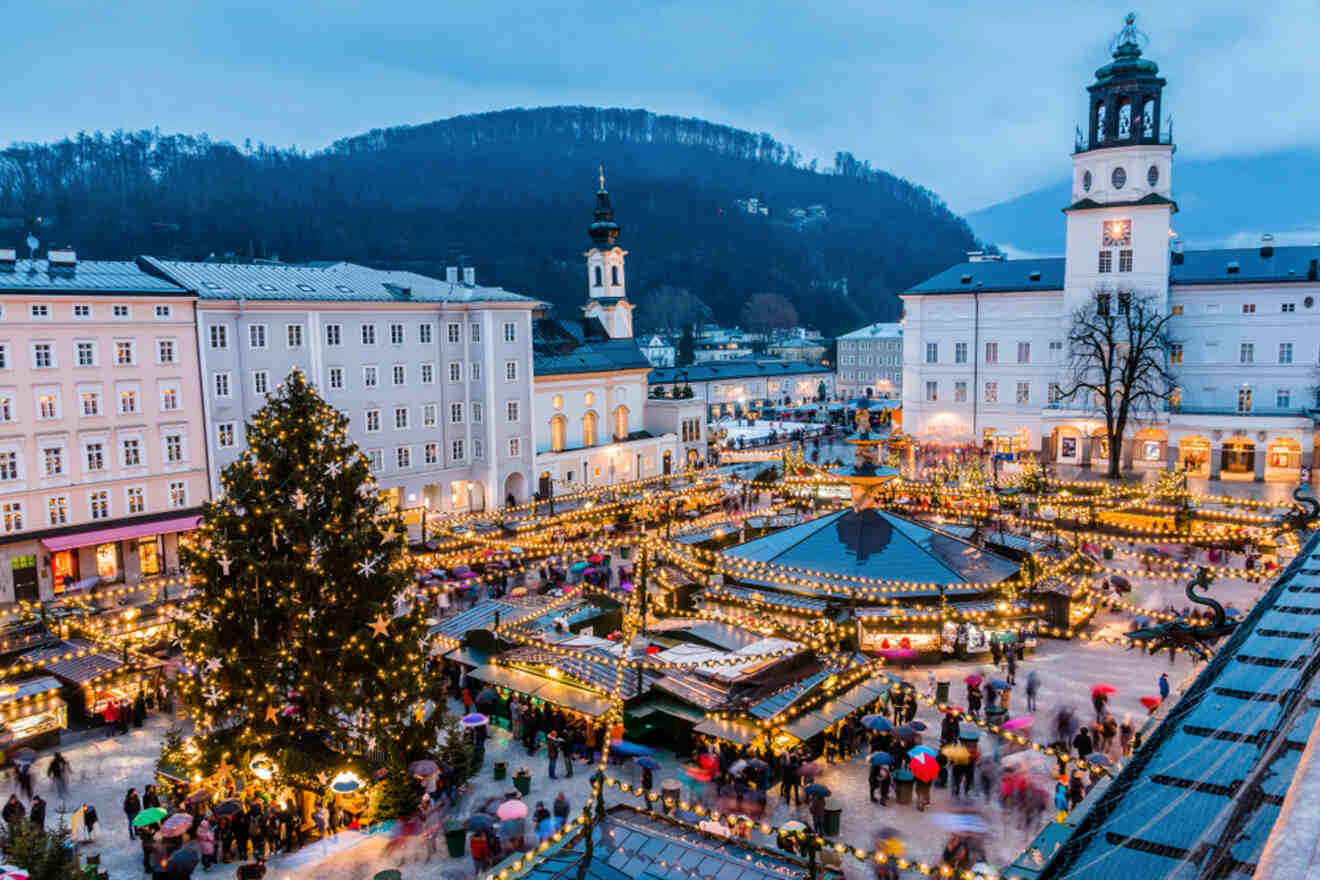 aerial view of a Christmas market in front of a cathedral
