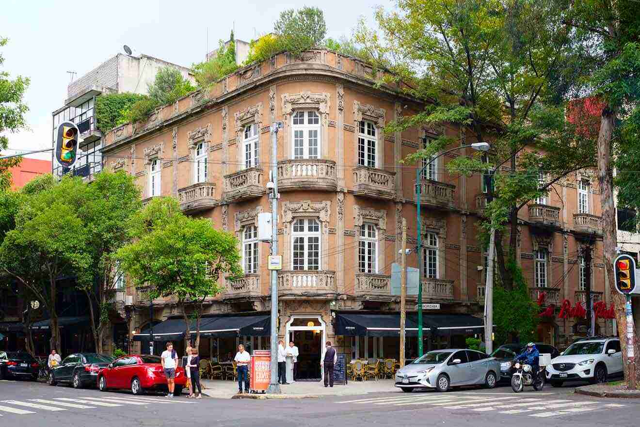 An old building with a restaurant on a corner in the area of Roma in Mexico City
