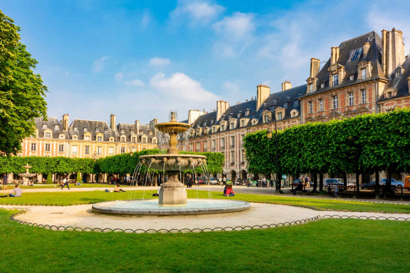 A fountain in the middle of place de vosges in paris, france.