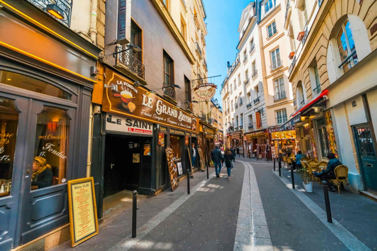 A street with many shops and restaurants in the latin quarter in paris