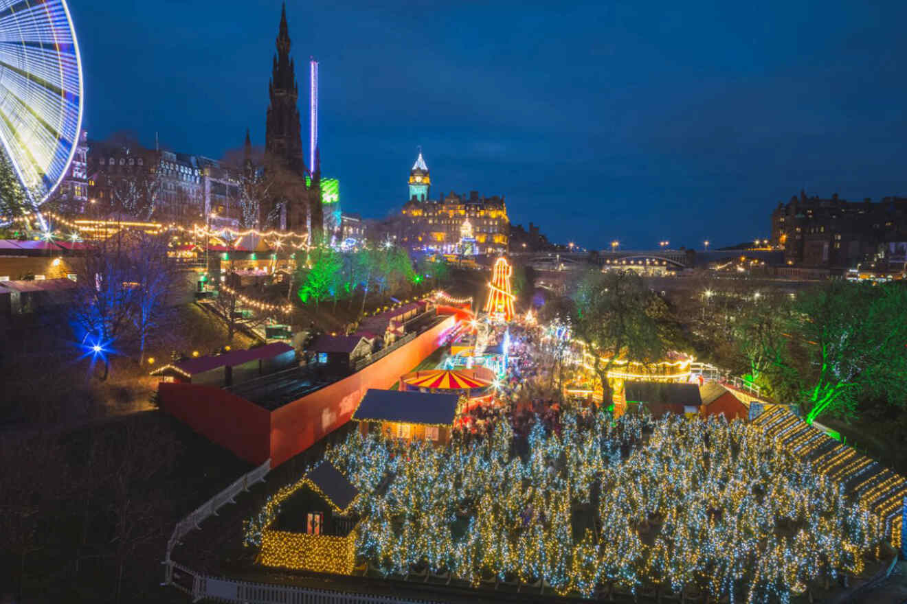 aerial view of a Christmas market with stalls and a lit-up trees labyrinth
