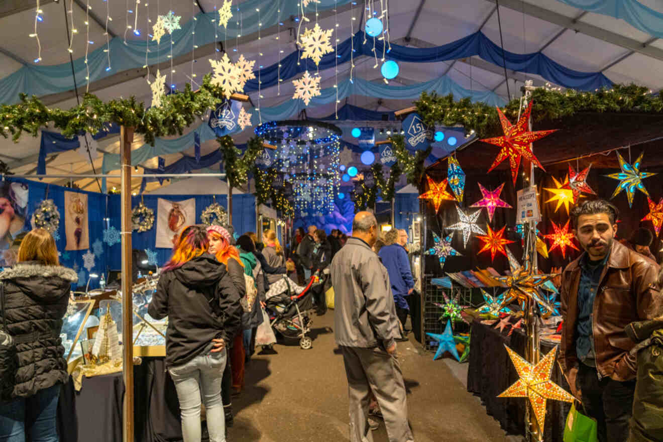 people walking around a Christmas market