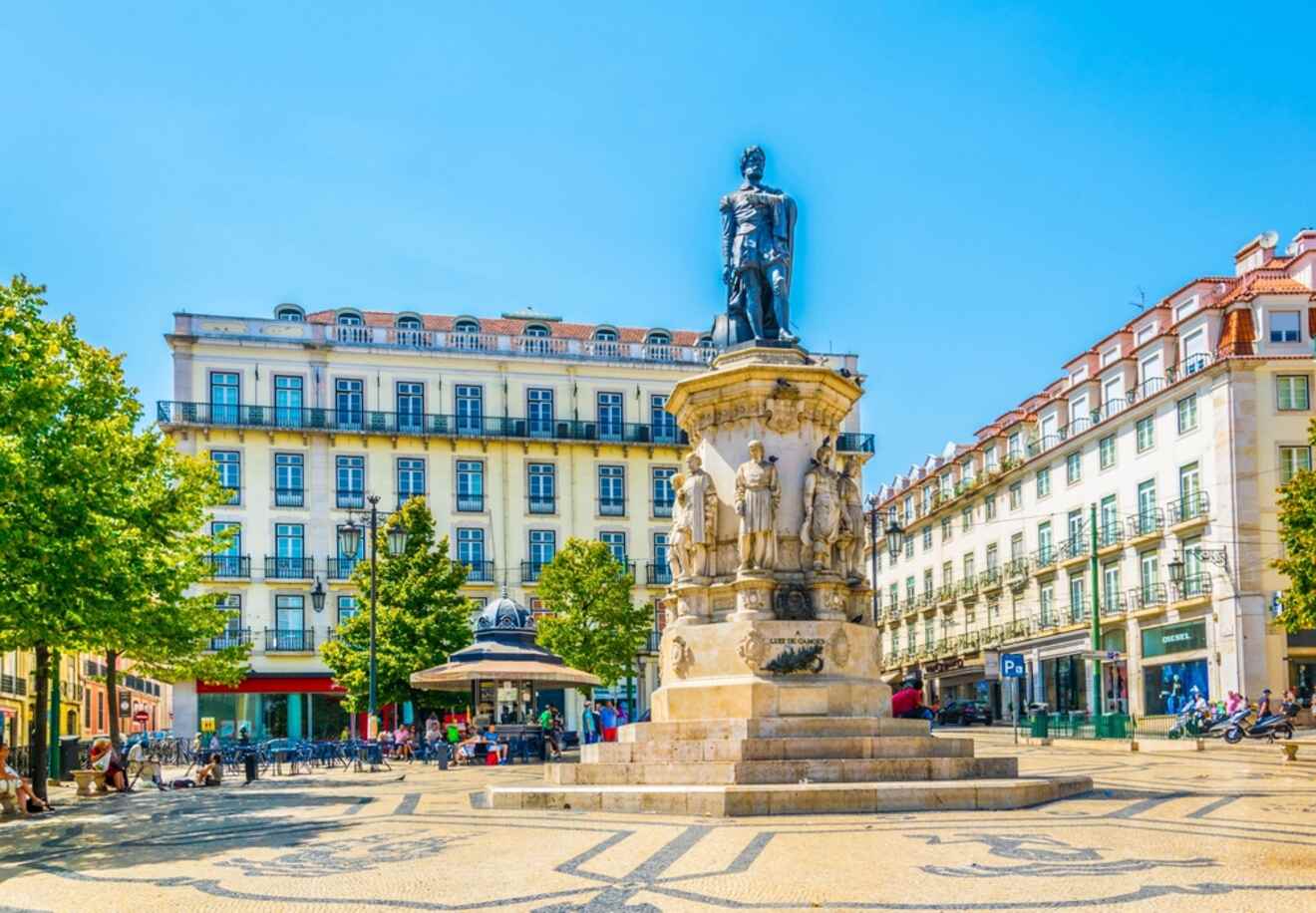 Praça Luís de Camões in Lisbon with a statue of Luís de Camões and historic buildings in the background.