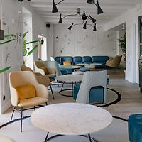 Stylish modern lobby in a boutique hotel with eclectic seating and chic interior design