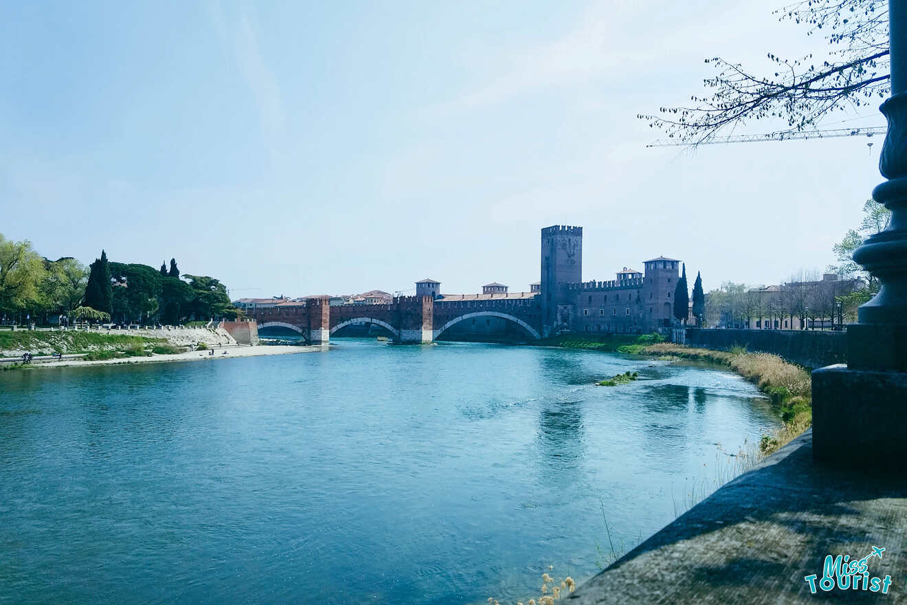 The Ponte Scaligero bridge crossing the Adige River in Verona, Italy, with the Castelvecchio and its tower in the background