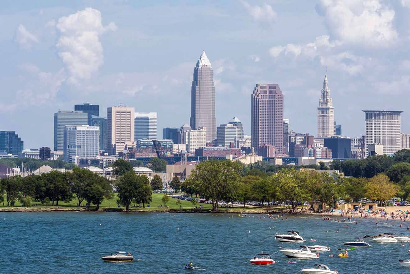 The Cleveland skyline viewed from the lakefront, showcasing the city's architecture and bustling waterfront activities.