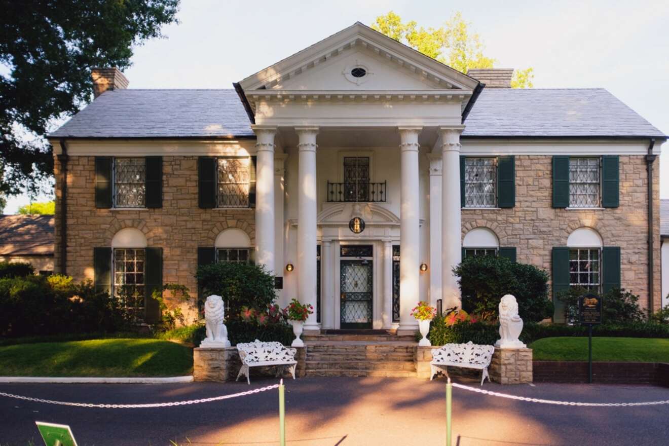 The historic Graceland Mansion in Memphis, the famous home of Elvis Presley, with its classic architecture and beautifully landscaped front lawn