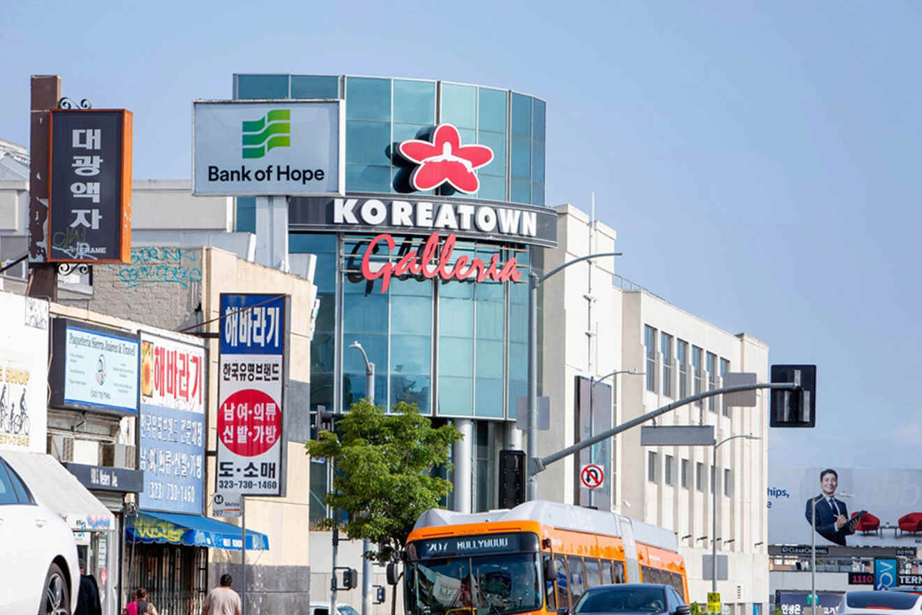 Street view of Koreatown Galleria in Los Angeles with various signs in Korean, showcasing the cultural diversity and bustling urban life.
