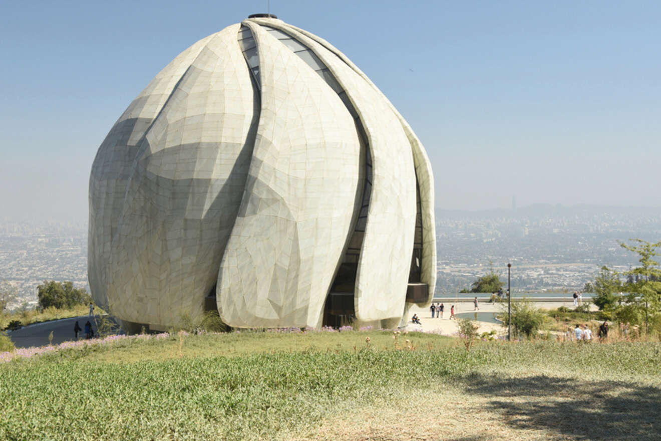 Unique architecture of the Baha'i Temple of South America in Santiago, Chile, with a view of the cityscape in the distance