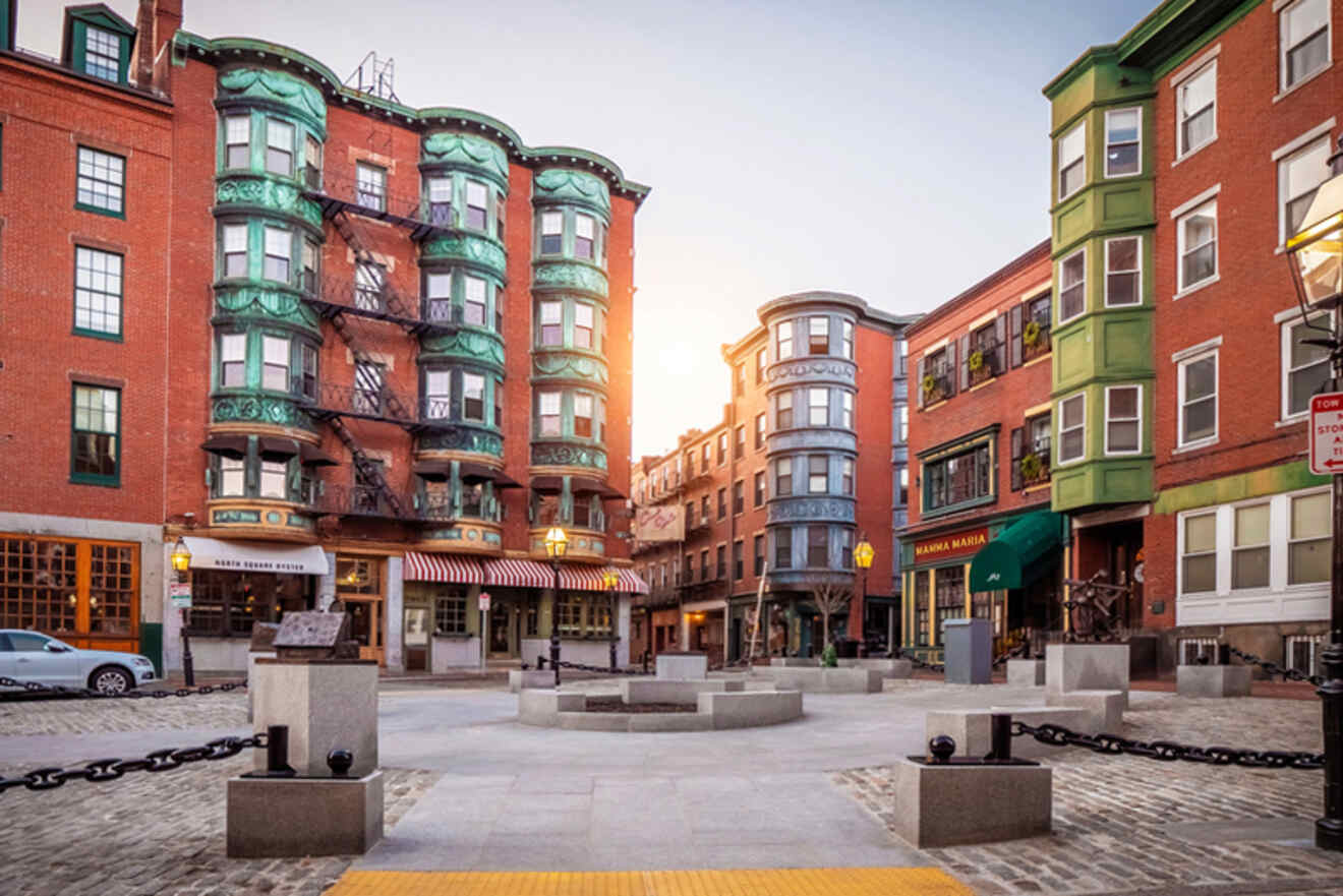 Picturesque street view in Boston's North End, showcasing colorful buildings with unique architecture and a quiet, inviting atmosphere.