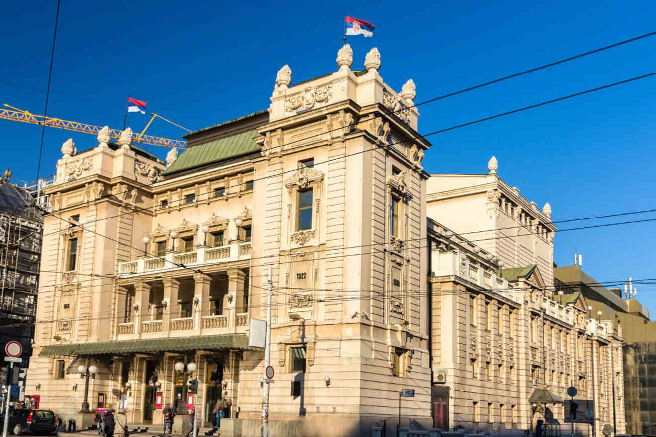 Exterior of the National Theatre in Belgrade with its elegant neoclassical architecture, clear blue sky in the background