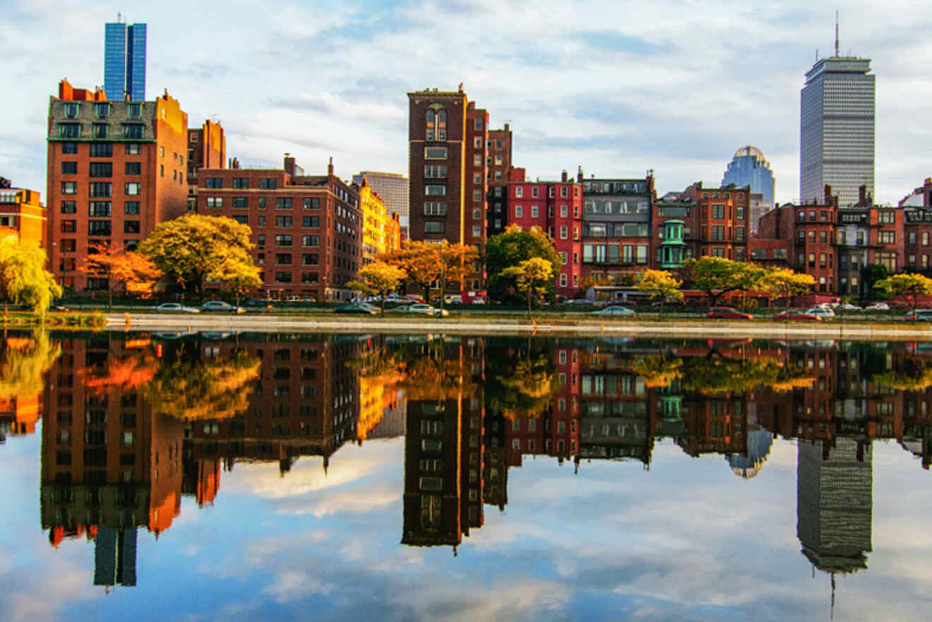 Vibrant autumnal reflection of the historic brownstone buildings along Back Bay in Boston, mirrored in the calm waters of the Charles River
