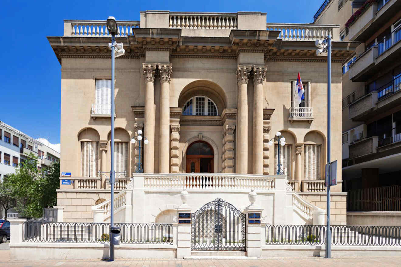 The front view of the Nikola Tesla Museum in Belgrade, housed in a classic building with columns, showing the city’s dedication to preserving the inventor’s legacy