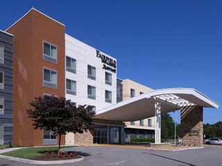 Exterior of Fairfield Inn & Suites by Marriott with a modern facade and distinctive canopy over the entrance