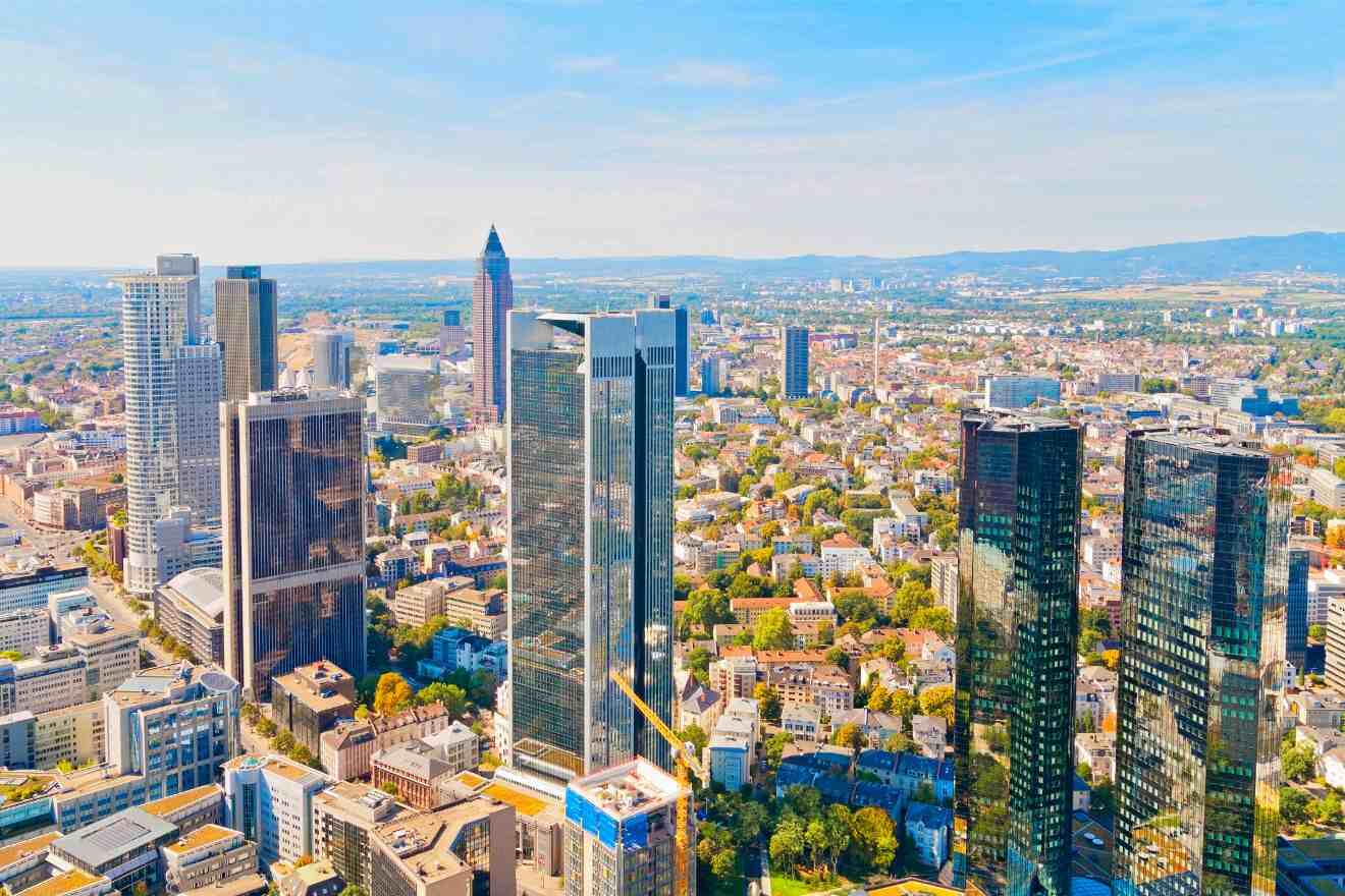 Spectacular skyline of Frankfurt with a clear view of its towering skyscrapers and commercial buildings, epitomizing the city's status as a major business and finance center