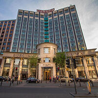 The Europa Hotel in Belfast stands impressively with a modern façade and grand entrance