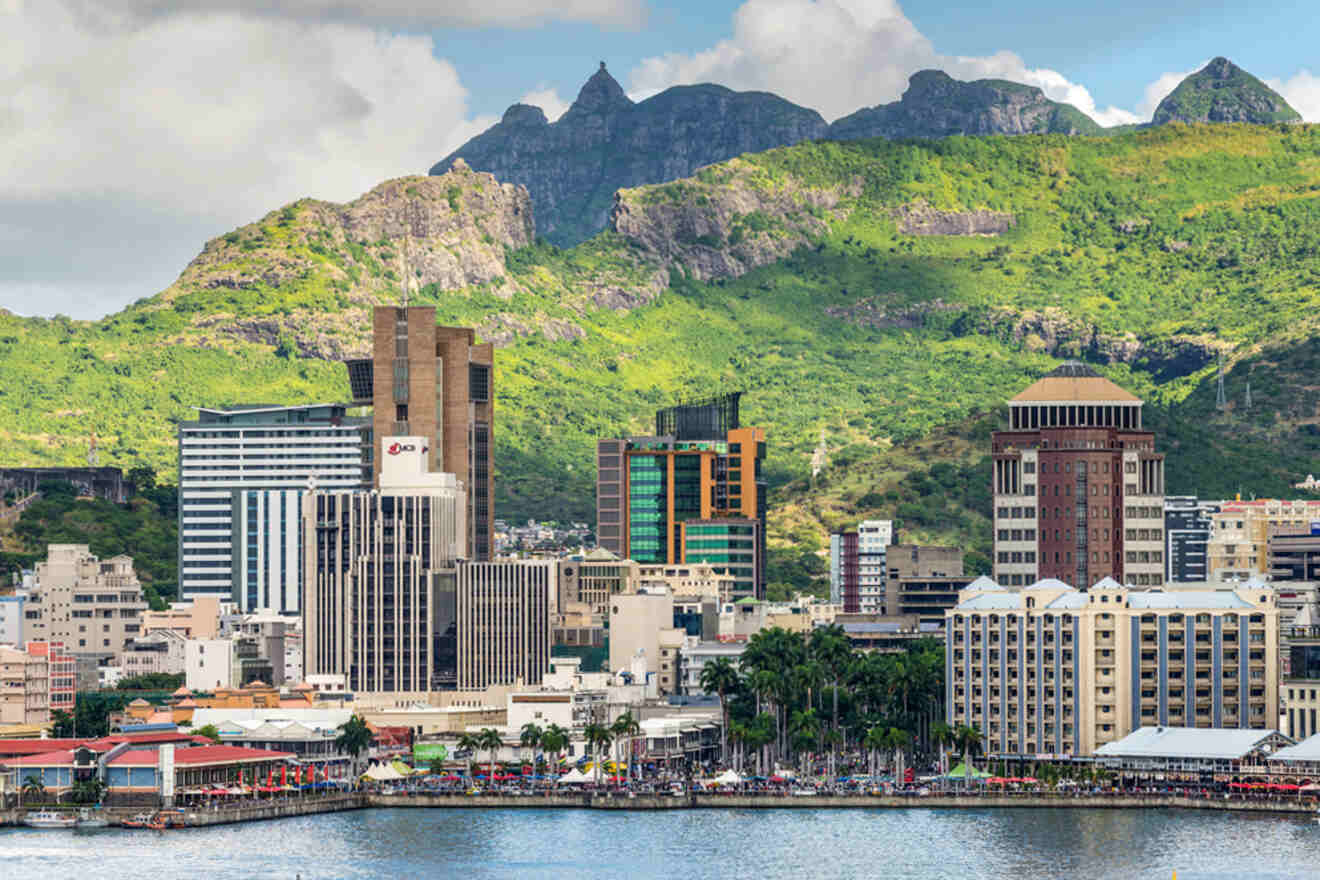 Port Louis, Mauritius' bustling capital, with its waterfront skyline set against a backdrop of green mountains
