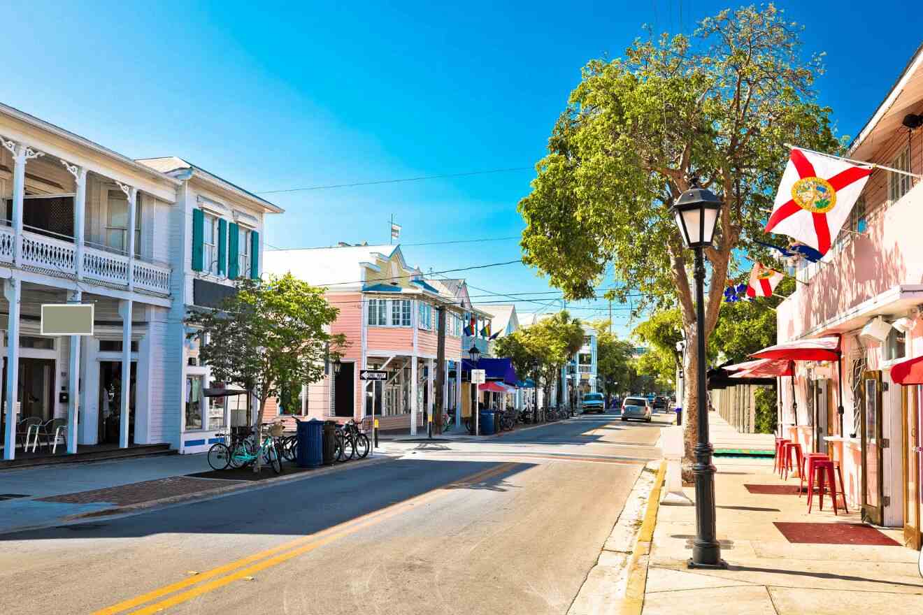 Sunny street view of pastel-colored buildings and quaint shops in Key West’s Old Town