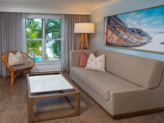 Modern living room with a nautical theme, including a large boat canvas
