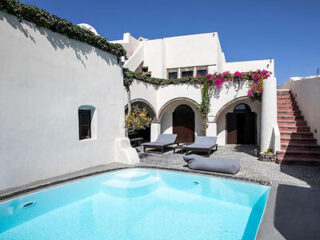 Private and serene pool courtyard with a crystalline pool