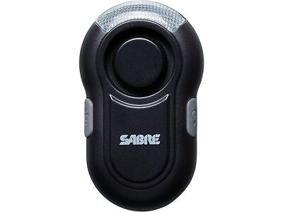 A black, oval-shaped personal alarm device with a center button and two side buttons, labeled "SABRE." It has a built-in LED light at the top.