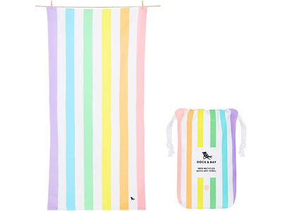 A pastel-colored striped towel hangs on a line next to a matching drawstring bag.