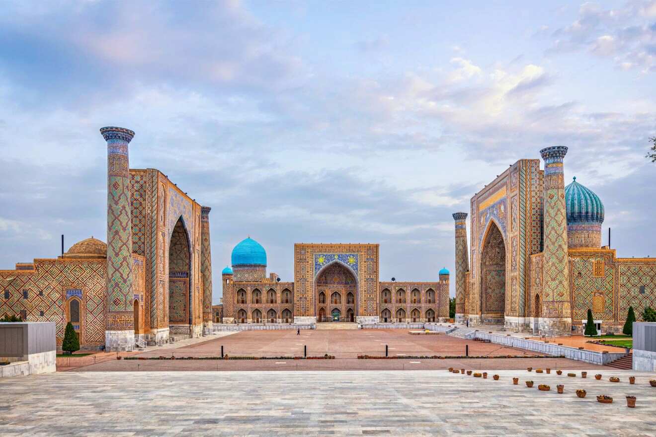 The majestic Registan Square in Samarkand, featuring grand Islamic architecture with intricate tilework and domes.
