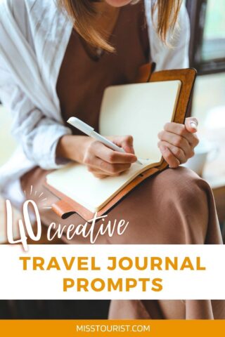 Person writing in a travel journal, with the text 