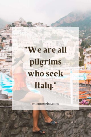 Image with quote: "We are all pilgrims who seek Italy." A woman wearing a hat sits on a stone wall overlooking a picturesque Italian town. The quote is displayed over the image.