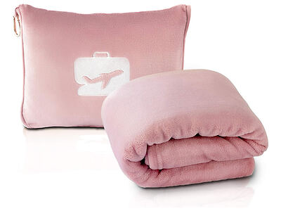 Pink travel blanket set with a folded blanket and a matching carrying pouch featuring an airplane and suitcase logo.