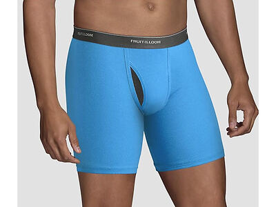 A man wearing bright blue Fruit of the Loom boxer briefs with a dark waistband, shown from the waist to mid-thigh.