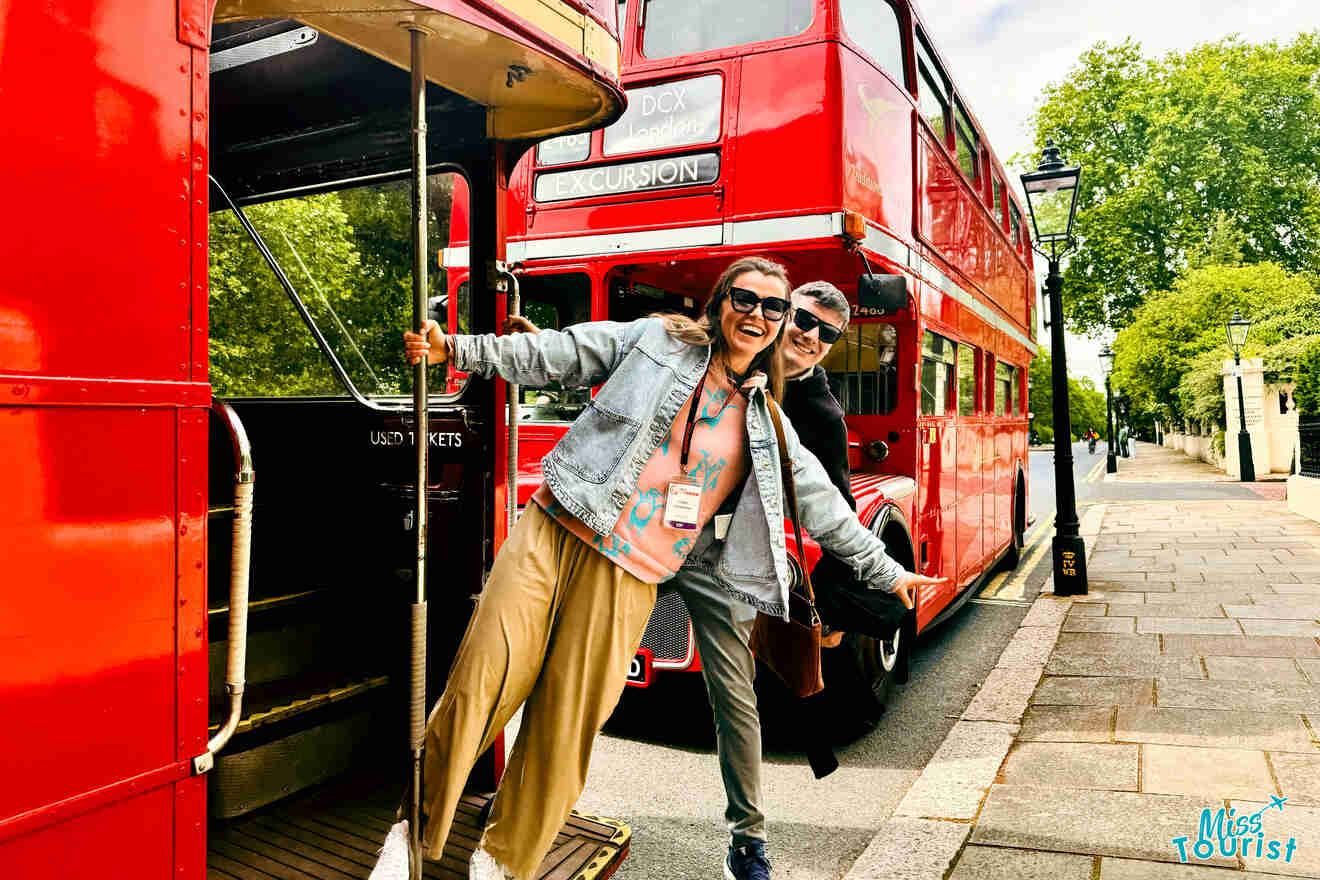 The founder of the page, Yulia, and her husband happily posing on an old-fashioned red double-decker bus in London