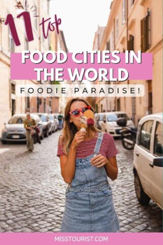 A person in a red shirt and denim overalls enjoys an ice cream cone in a cobblestone street. The text reads: "11 Top Food Cities in the World - Foodie Paradise!.