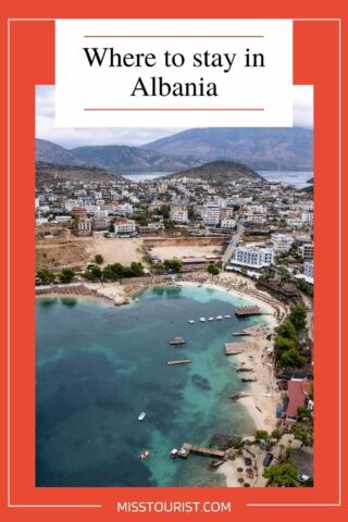 Aerial view of a coastal town in Albania with beaches, buildings, and surrounding hills. The text "Where to stay in Albania" is at the top, and "MISSTOURIST.COM" is at the bottom.