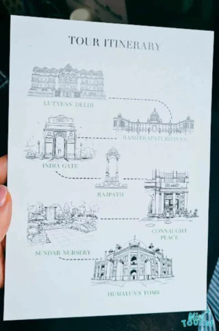 A tour itinerary card with sketches of famous landmarks in Delhi, including India Gate and Rashtrapati Bhavan.