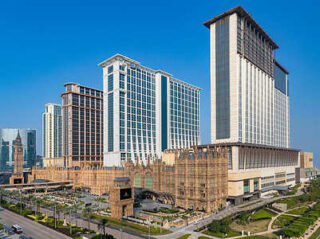 Sheraton Grand Macao exterior featuring towering white buildings with modern architecture