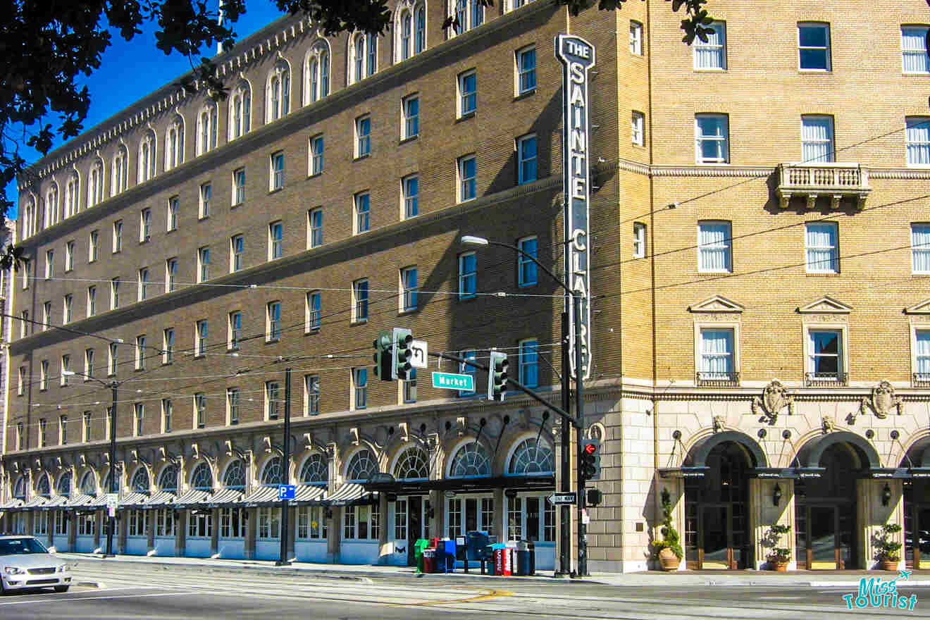 Historic multi-story brick building with arched windows and 