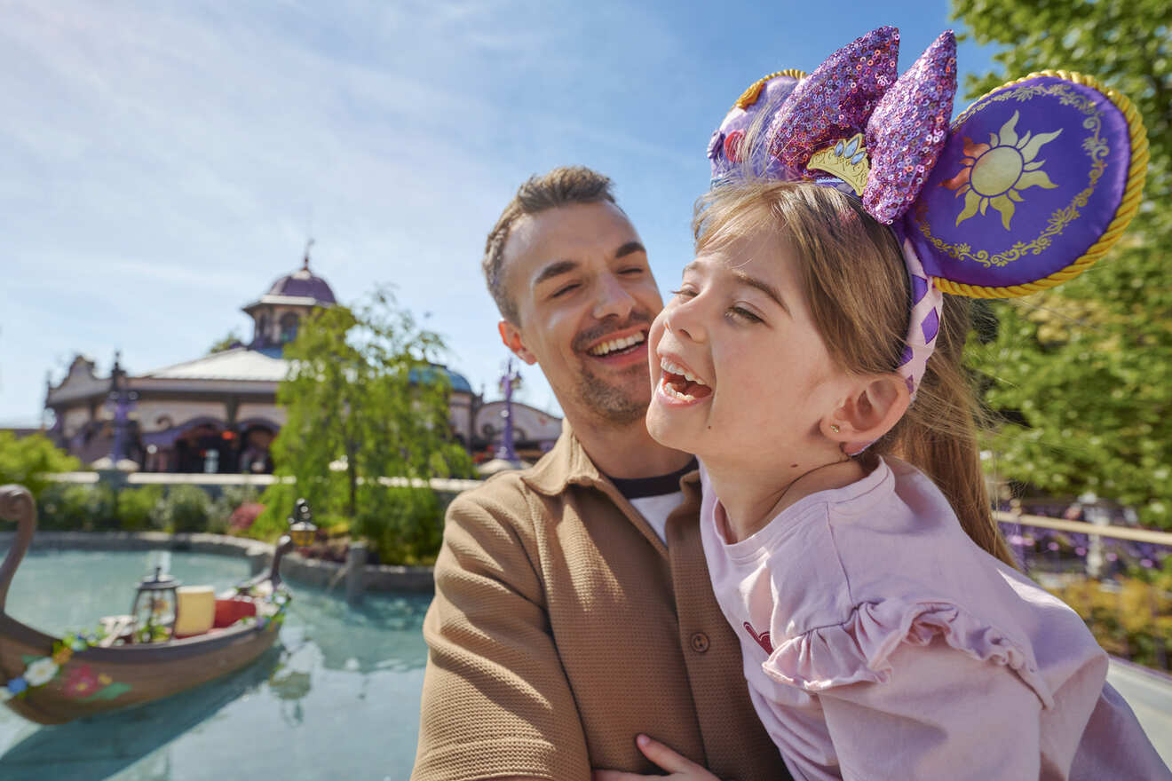 Family enjoying a summer day trip to Disneyland Paris from Paris