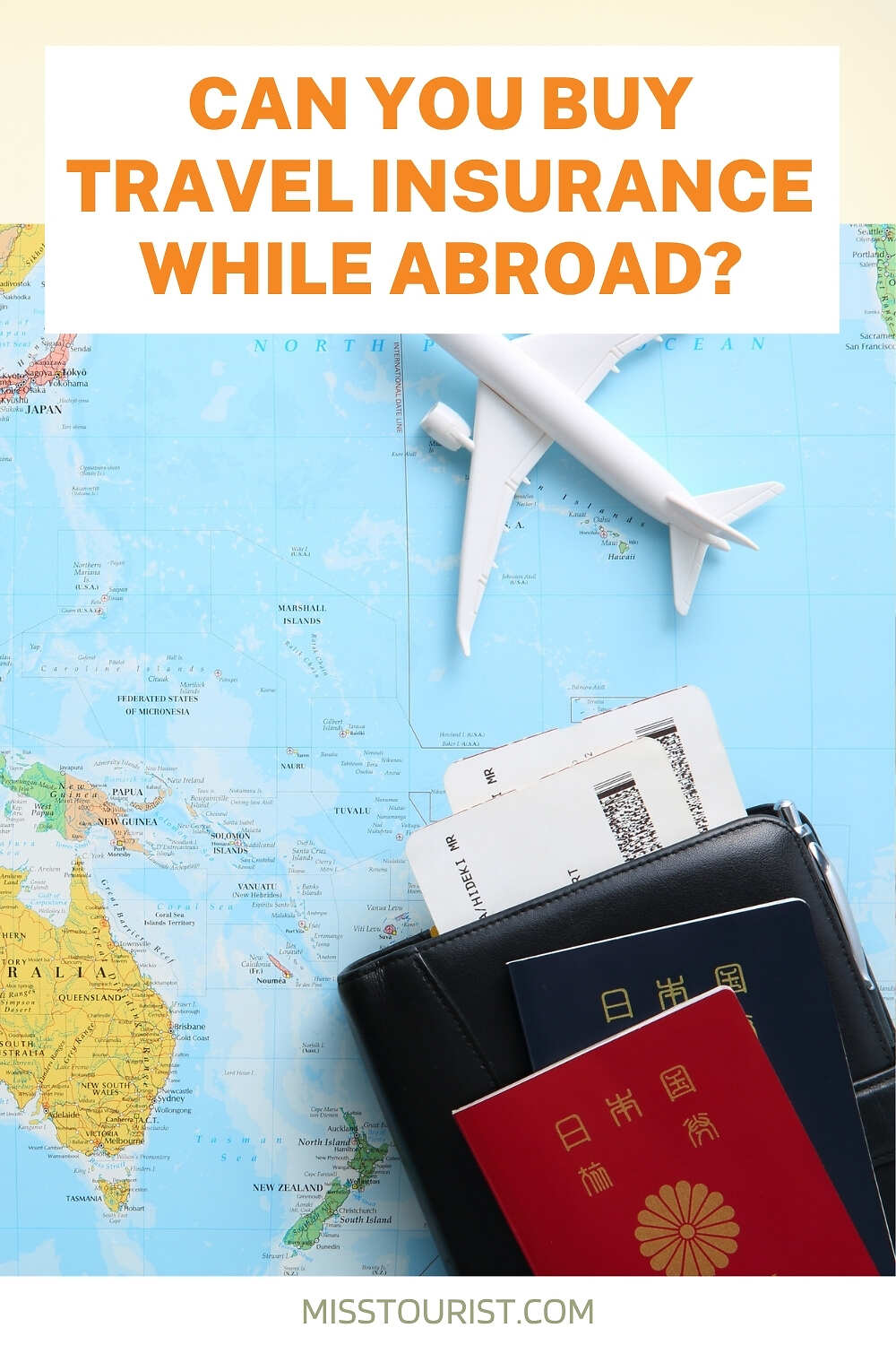 A toy airplane, passports, and travel documents rest on a world map with the text, “Can you buy travel insurance while abroad?” at the top.